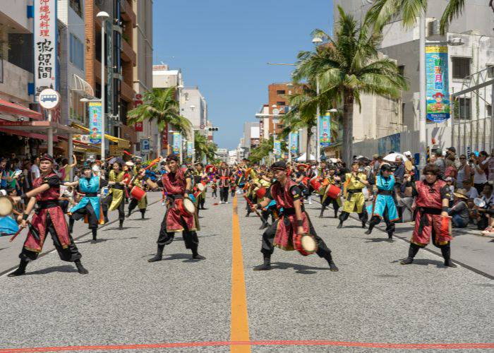 10,000 Eisa dancers lining the streets of Okinawa, dancing and banging drums.